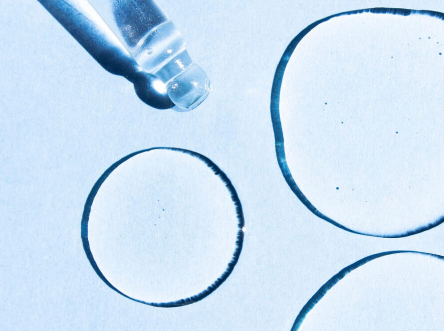 close-up-of-drops-of-transparent-cosmetic-hyaluronic-acid